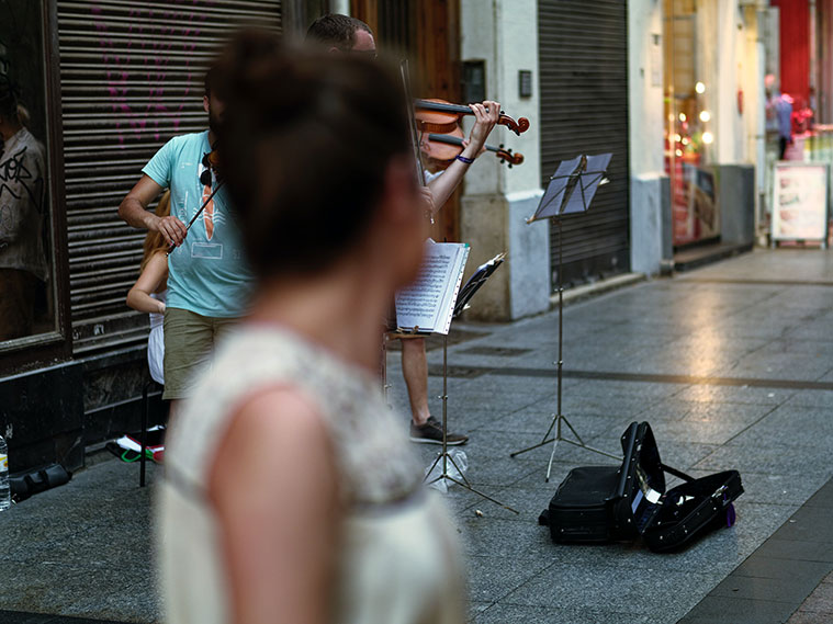 Musicos callejeros en la calle alfonso de Zaragoza
