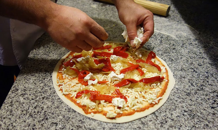 Restaurante Il Principale preparación de pizzas